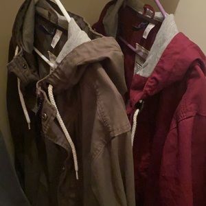 Maroon-ish Red Jacket and a(n) dookie😂 green jacket both Larger Men jackets.